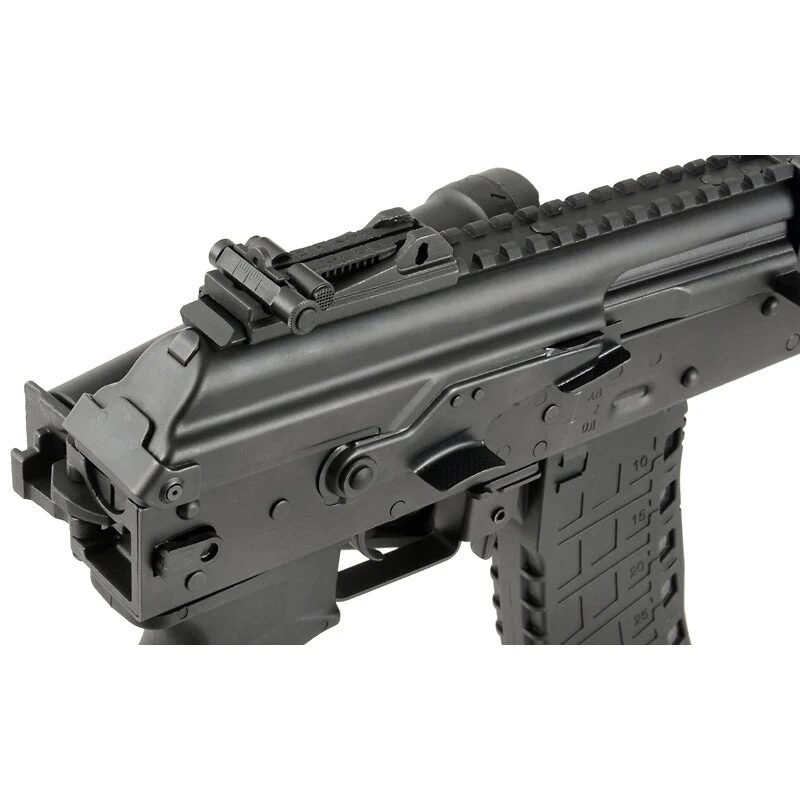 Close-up of the Arcturus AK12 AEG FE assault rifle showing the iron sights, dust cover, and textured magazine.