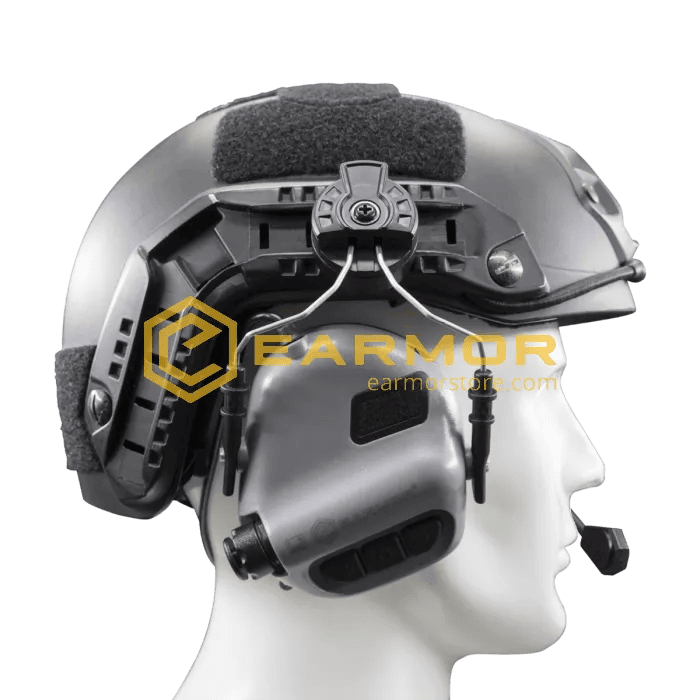Earmor M11 ARC Helmet Adapter attached to a helmet-mounted hearing protector on a mannequin head.