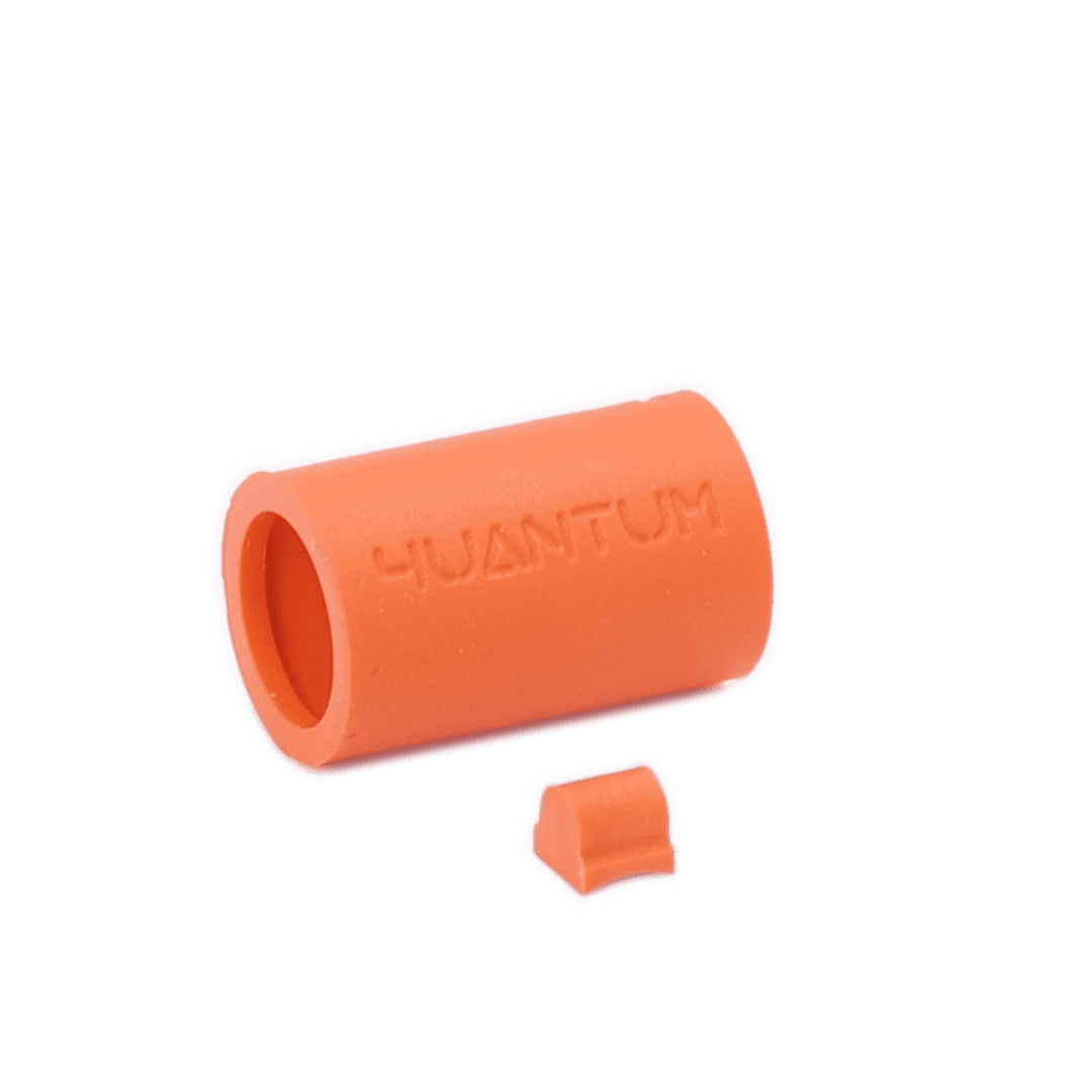 4UANTUM Friction Pro-High Performance GBB Bucking, including an orange rubber airsoft hop-up bucking and a small rectangular nub.