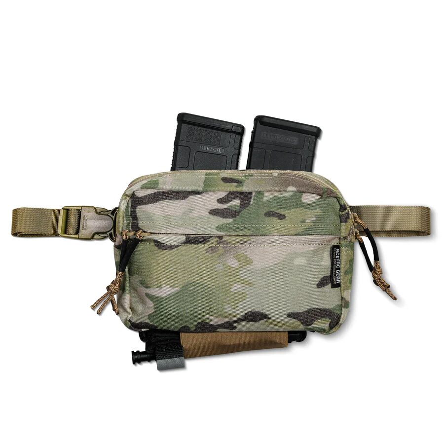 ACETAC Swag V2 Hybrid Fanny Pack in camo print holding two black rifle magazines with an attached tourniquet at the bottom.
