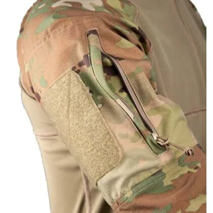 Close-up of a Propper OCP Combat Shirt Long Sleeve featuring a camouflage patterned shoulder, a zippered pocket, and a rectangular hook-and-loop patch panel.