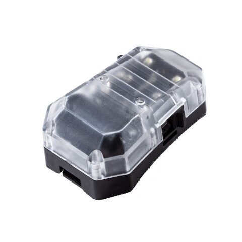 F101 “Stealth” Survival Light, a rectangular portable light with a black base and a clear, protective top cover.